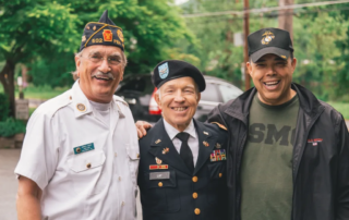 three elderly war veterans
